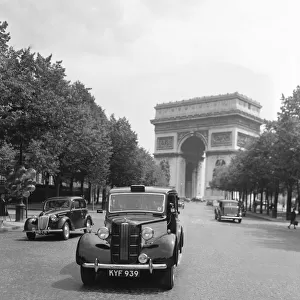 A Austin FX3 taxi part of the London to Paris taxi service seen here at the Arc de