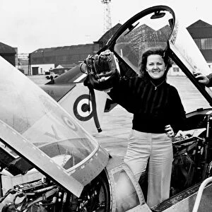 Avril Abdrews stands in the cockpit of a £2 million Phantom jet at RAF Leuchars in