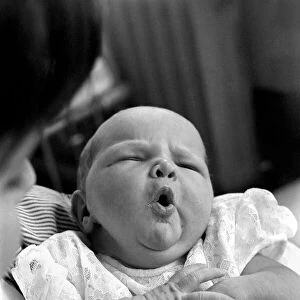 Baby girl yawns in the childrens hospital in Myrtle street, Liverpool