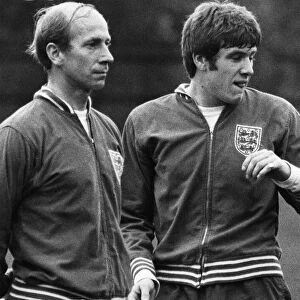 Bobby Charlton (left) and Emlyn Hughes (right) pictured during an England football