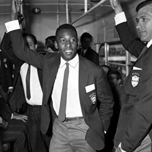 Brazilian football star Pele on the bus as the Brazilian squad arrives at London airport