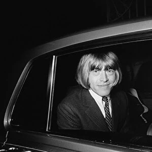 Brian Jones of the Rolling stones pop group is whisked away in a Rolls Royce after