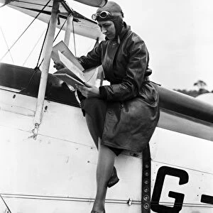 British aviator Amy Johnson pictured in the cockpit of her Gipsy Moth plane before taking