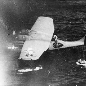 A US Catalina flying boat rescues members of a Flying Fortress crew who had been forced