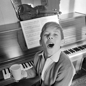 Children. Humour: Young boy at home setting at the piano. November 1969 Z11493-002