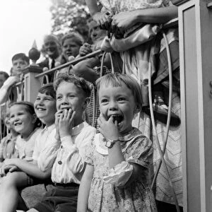 Children Watching Punch and Judy in the Arch Bishops Park in London. August 1952 C3944