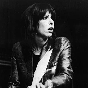 Chrissie Hynde singer with The Pretenders pop group 1982 playing guitar in concert
