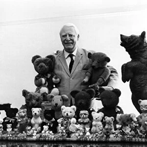 The colonel and his teddy bears. Colonel Robert Henderson with his army of teddy bears