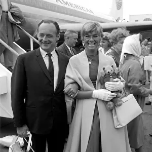 Donald Campbell with his wife arriving at London Airport on a Pan Am flight from los