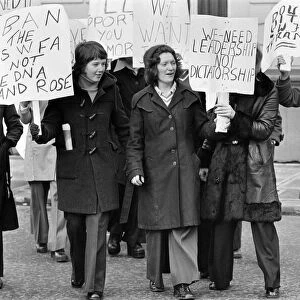 Female football player, Edna Neillis, leads a protest march through Glasgow protesting