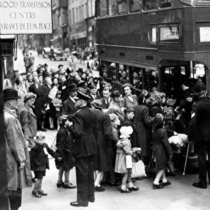 Flashback to the dark days of 1939, as Liverpool children board a bus to take them to