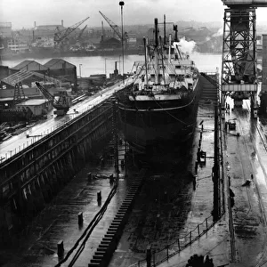 The giant size of the dry dock at Brigham and Cowans, South Shields is seen here with