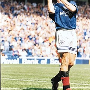Glasgow Rangers footballer Paul Gascoigne pretending to play the lute during a pre season