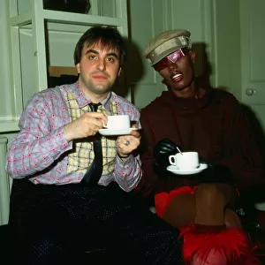 Grace Jones drinking tea with Billy Sloan April 1983