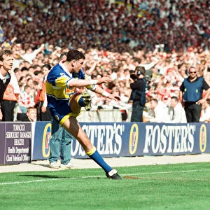 Graham Holroyd kicks for goal for Leeds during the Rugby League Cup Final at Wembley