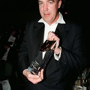 Jeremy Clarkson TV Presenter March 98 Holding award for best tv car show