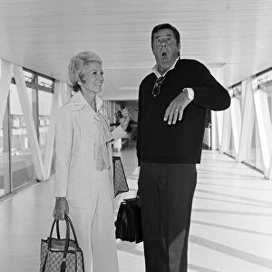 Jerry Lewis arrived at Heathrow Airport today from New York with his wife Patti