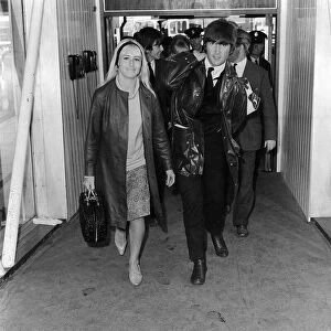 John Lennon and Cynthia 26 May 1964 at Heathrow Airport