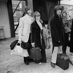 John Lennon with wife Cynthia and George Harrison and his wife Patti Boyd at Heathrow
