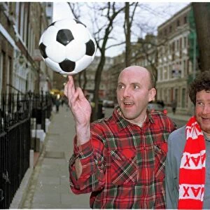 Lee Hurst and Rory McGrath fooling around in London. Two comedians comics from