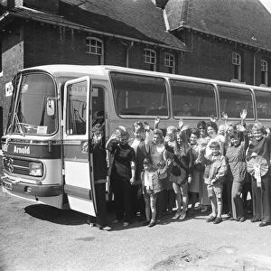 Leeds wives and children board the coach bound for Wembley to watch their husband play