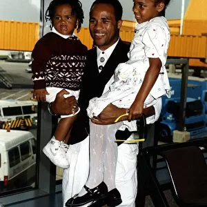 LLoyd Honeyghan Boxing Holding his Son and Daughter