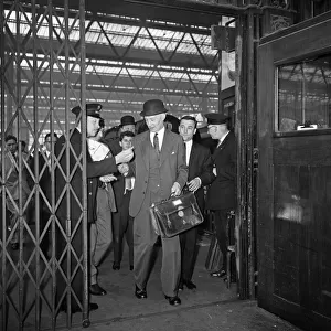 Lord Denning, Minister of the Rolls arrives at Waterloo Station to present his report