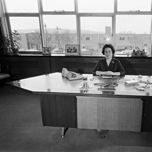 Mary Harris at her desk in the Mary Harris dress factory at the Team Valley Trading