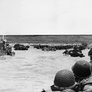 Photo taken from an American landing craft approaching a beachhead oh the northern coast