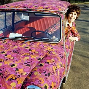 Pink and orange coloured paisley Mini, February 1969 Sandra Ford driving her