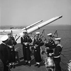 Pipers on board the Aircraft Carrier HMS Illustrious 1950