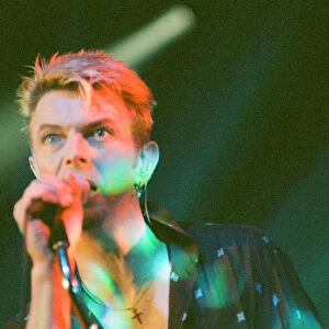 Pop star David Bowie performing on stage during a concert at The Barrowlands in Glasgow