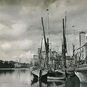 The Port at Ipswich is busy again after the War. barges dock to discharge