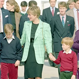 Princess Diana with Prince Harry and William board a Candian military helicopter after