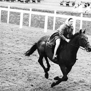 Princess Margaret riding a horse at Ascot before spectators arrive for meeting