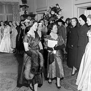 The Queen Mother and Princess Margaret seen here at the Salon of clothes designer Hardy