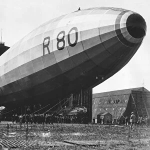 The R80 Airship being launched from it shed July 1920 The figure sitting on top of