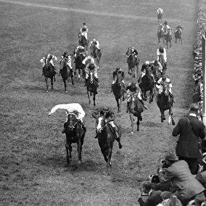 Racehorse Humorist ridden by jockey Steve Donaghue wins the Epsom Derby, June 1921