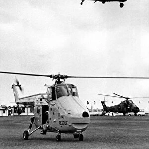 A RAF Westland Whirlwind search and rescue helicopter stands by as strike command
