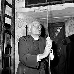 Religion: Arthur Michael Ramsey. The Archbishop of Canterbury tolling the bell
