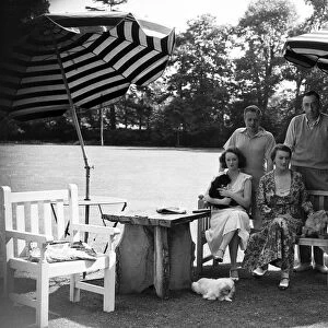 Sir Francis Towle, Lady Towle, Clifford Whitley and Elsa MacFarlane photographed at