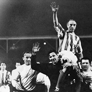 Sir Stanley Matthews is carried from the pitch in celebration following his testimonial