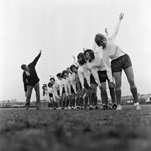 Southampton Ladies Football Club limber up with their manager Mr Norman Holloway