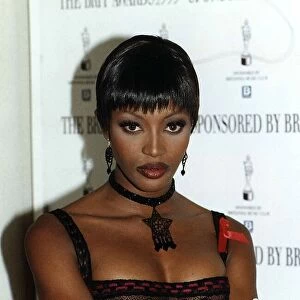 Supermodel, Naomi Campbell, Wearing Black lace dress and Black neck piece