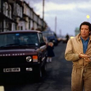 Tom Jones walking through Pontypridd December 1987