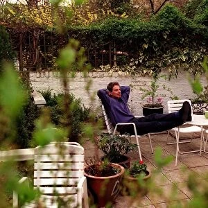 Tony Blair Labour Party leader at home resting in the garden sitting on chair