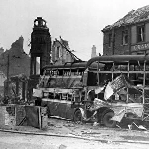 Trolley buses and business premises which were badly damaged in a raid on a town in