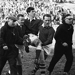 Wales Probables v Possibles, Swansea Jan 1967. Probables fly half Barry John is carried