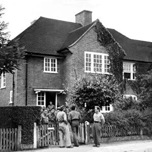 War Prisoners, Italians at the gate of a house in Woodhall Gate, Pinner Wood Estate