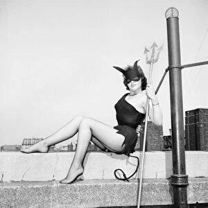 Women dressed as She Devil. Model: Pamela Dennis. May 1957 E270-013